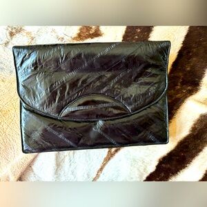 Beautiful, super soft eel skin clutch. Perfect condition. Perfect size. 2016